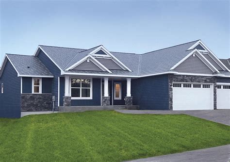 blue house with black metal roof|blue metal roofing panels.